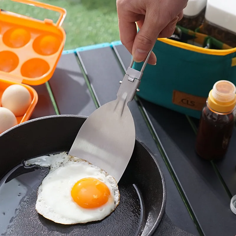 Opvouwbare kampeer-spatel van  - Quechua Camping Cooking Set recensie en prijs